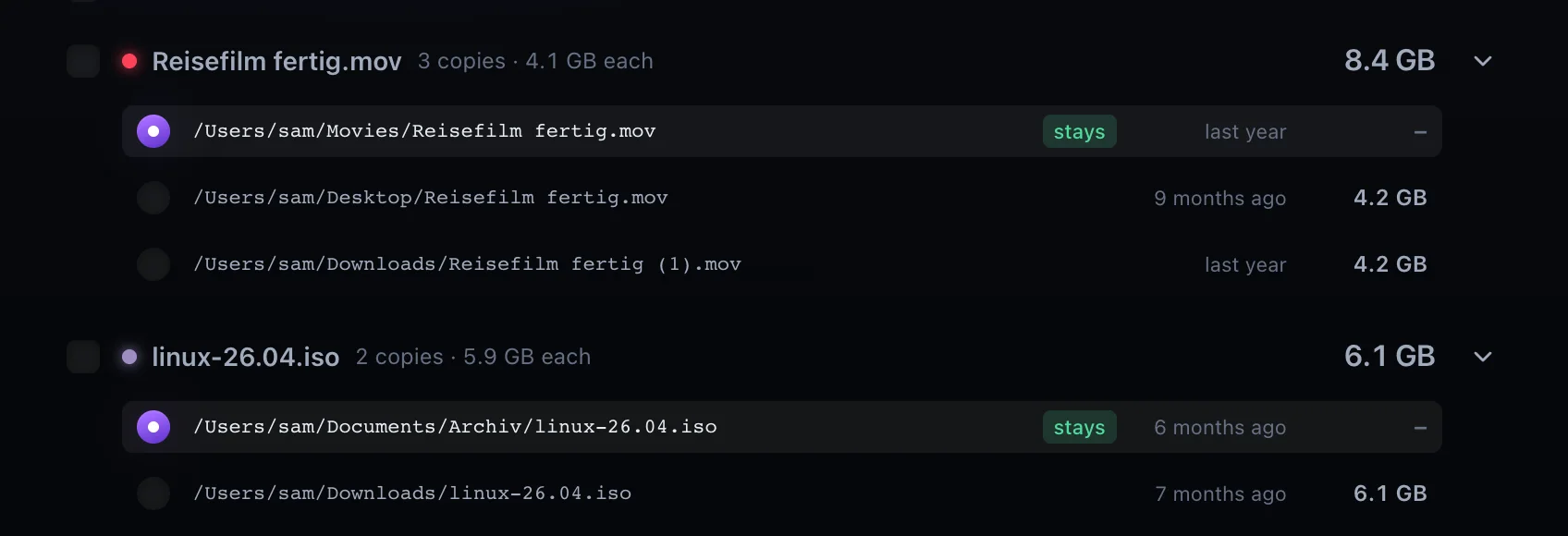 In front, the duplicates: the copy that stays in each group and the extra copies with path, age and size.